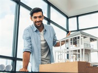 Shutterstock_2437277169_engineer inspect house model_engineer inspects house model.jpg