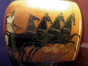 WIKI_20260119_Panathenaic_prize_amphora_of_a_chariot_race,_Made_in_Athens_about_410–400_BC,_found_at_Taucheira_in_Cyrenaica,_modern_Libya,_Winning_at_the_ancient_Games,_British_Museu.jpg