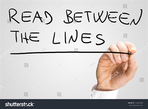 stock-photo-male-hand-writing-phrase-read-between-the-lines-on-virtual-screen-192481988.jpg