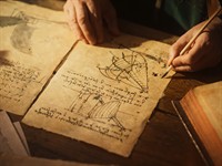 shutterstock_2390494447_Historian Taking Notes_Vēsturnieks veido pierakstus.jpg
