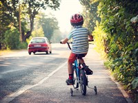 shutterstock_221224405_boy on bicycle_zēns uz velosipēda.jpg
