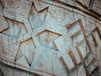 shutterstock_1697577319_latvian ornaments engraved on tree_latviešu ornamenti iegravēti kokā.jpg