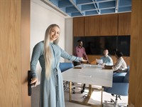 shutterstock_2602266385_inviting to a conference room_ielūdz konferenču zālē.jpg