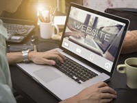 Shutterstock_524854771_business hand typing on a laptop_biznesa roka raksta uz klēpjdatora.jpg