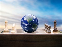 shutterstock_2461740153_Earth globe on a chessboard_Planēta uz šaha dēļa.jpg