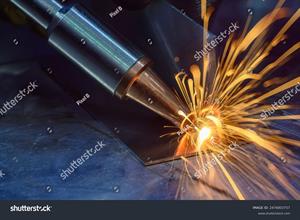 stock-photo-close-up-scene-the-laser-welding-process-by-hand-held-laser-welding-machine-the-high-technology-2476803757.jpg