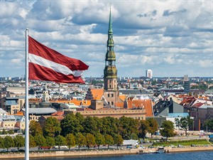 shutterstock_2420302739_Riga with Latvia flag_Rīga ar Latvijas karogu.jpg