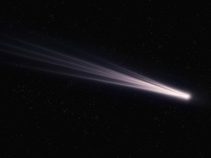 shutterstock_2268518573_Long tail of a comet glows in space_Komētas garā aste spīd kosmosā.jpg