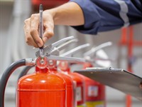 Shutterstock_2357427071_inspection of a fire extinguishers_ugunsdzēšamo aparātu pārbaude.jpg