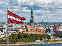 shutterstock_2420302739_Riga with Latvia flag_Rīga ar Latvijas karogu.jpg